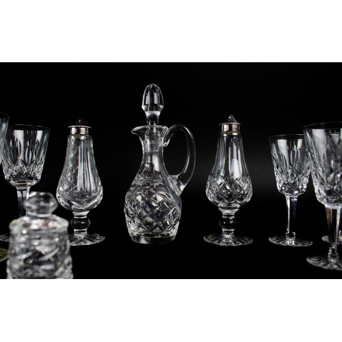 16 - WATERFORD GLASSWARE, a large collection comprising six champagne flutes, six white wine glasses, twe... 