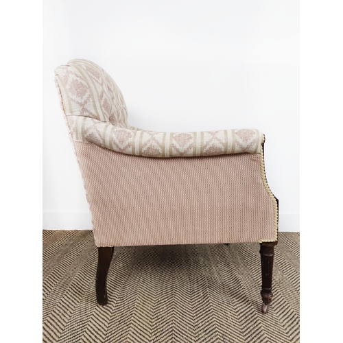 128 - ARMCHAIR, late Victorian mahogany in patterned cream upholstery on front castors, 87cm H x 67cm W.