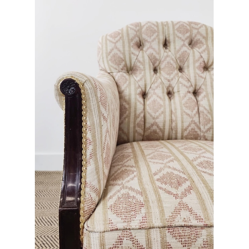 128 - ARMCHAIR, late Victorian mahogany in patterned cream upholstery on front castors, 87cm H x 67cm W.