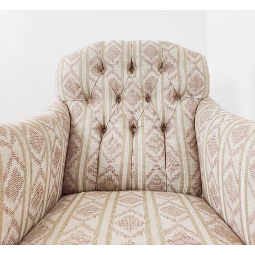 128 - ARMCHAIR, late Victorian mahogany in patterned cream upholstery on front castors, 87cm H x 67cm W.