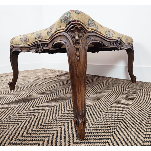 129 - STOOL, 19th century French walnut with concave sides and floral upholstery, 37cm H x 67cm W x 70cm D... 