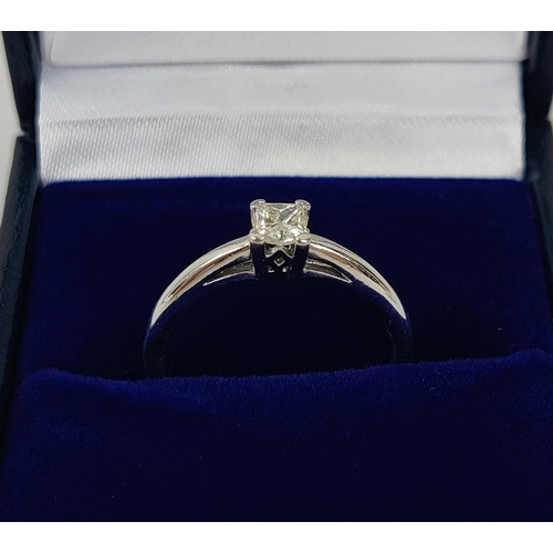 15 - AN 18CT WHITE GOLD DIAMOND SOLITAIRE RING, princess cut stone of approximately 0.28 carats, with a g... 