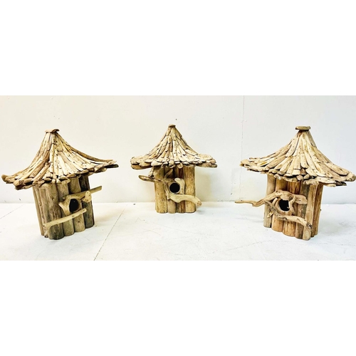 350 - BIRD HOUSES, a set of three, Oriental style driftwood, 50cm H x 40cm W x 24cm D. (3)