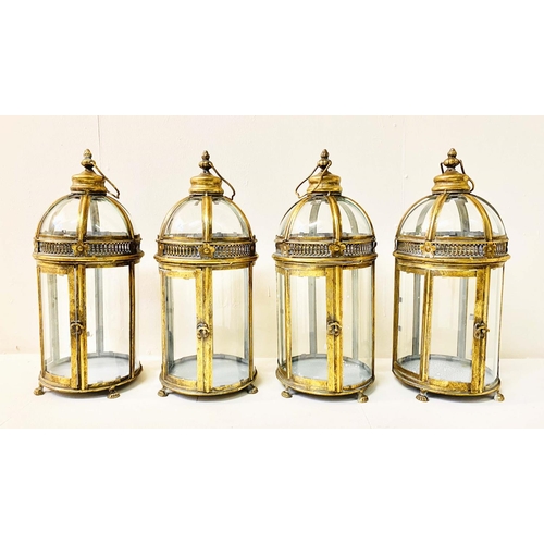 357 - LANTERNS, a set of four, Regency style gilt metal and glass, 46cm H x 19cm W x 19cm D. (4)