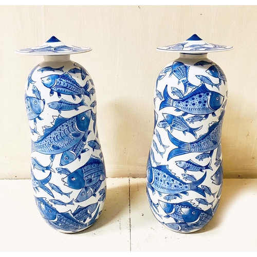 358 - GINGER JARS, a pair, Chinese style blue and white ceramic with carp decoration, 44cm H x 17cm W. (2)