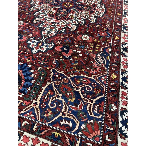 75 - BAKTIARI CARPET, 435cm x 288cm.