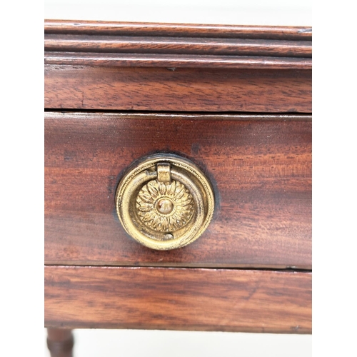 81 - WRITING TABLE, George III period mahogany, with single full width frieze drawer and ring turned tape... 