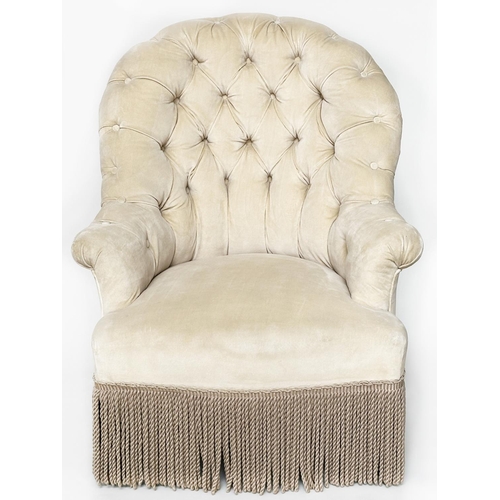 92 - ARMCHAIR, early 20th century buttoned primrose yellow chenille velvet with arched back, scroll arms ... 