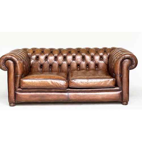 99 - CHESTERFIELD SOFA, traditional hand finished deep buttoned antique, tan leather upholstered with rou... 