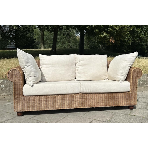 102 - CONSERVATORY TERRACE SOFA, woven cane with rounded arms and cushions, 200cm W.