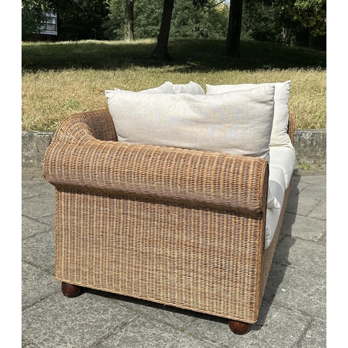 102 - CONSERVATORY TERRACE SOFA, woven cane with rounded arms and cushions, 200cm W.