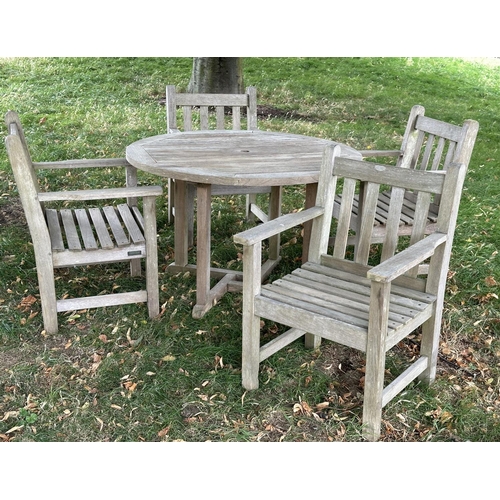 108 - GARDEN TABLE AND CHAIRS BY BARLOW TYRIE, well weathered teak circular slatted table with four matchi... 