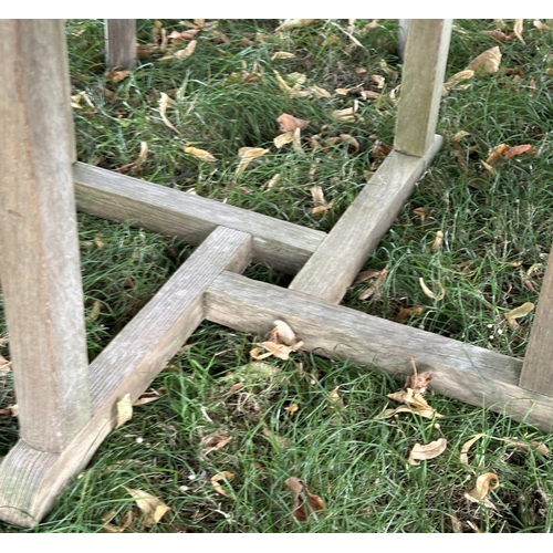 108 - GARDEN TABLE AND CHAIRS BY BARLOW TYRIE, well weathered teak circular slatted table with four matchi... 