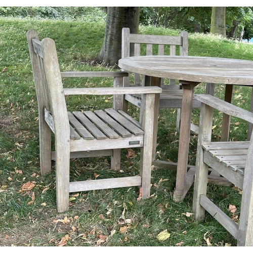 108 - GARDEN TABLE AND CHAIRS BY BARLOW TYRIE, well weathered teak circular slatted table with four matchi... 