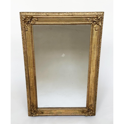 86 - WALL MIRROR, 19th century giltwood and gesso moulded rectangular with ripple moulded frame and rose ... 