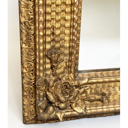 86 - WALL MIRROR, 19th century giltwood and gesso moulded rectangular with ripple moulded frame and rose ... 