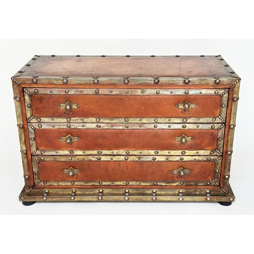 98 - CHEST, vintage hand finished leather bound and brass studded throughout with three long drawers, 90c... 