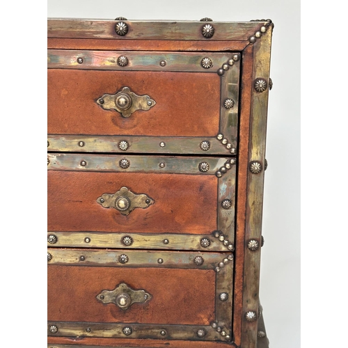 98 - CHEST, vintage hand finished leather bound and brass studded throughout with three long drawers, 90c... 