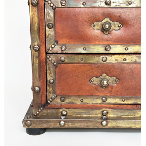 98 - CHEST, vintage hand finished leather bound and brass studded throughout with three long drawers, 90c... 