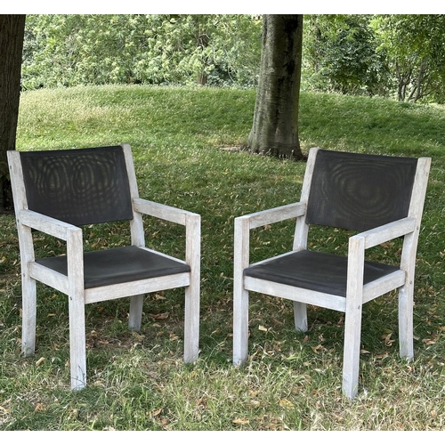 110 - GARDEN ARMCHAIRS BY PANAMA, a pair, weathered teak and all weather 'mesh' panelled, 58cm W. (2)