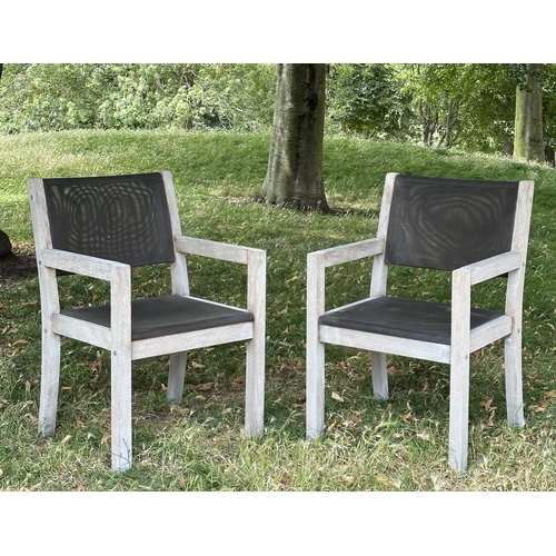 110 - GARDEN ARMCHAIRS BY PANAMA, a pair, weathered teak and all weather 'mesh' panelled, 58cm W. (2)