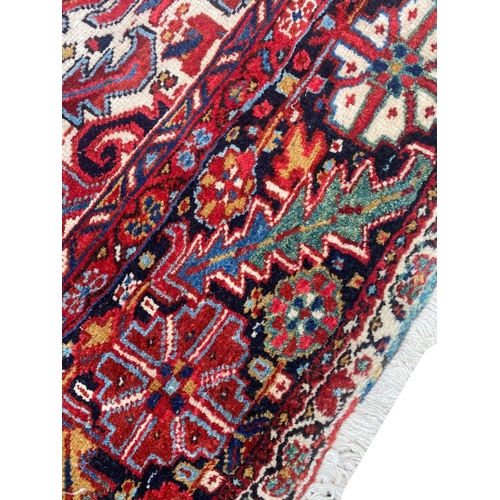 59 - ANTIQUE NORTH WEST PERSIAN HERIZ CARPET, 420cm x 300cm.