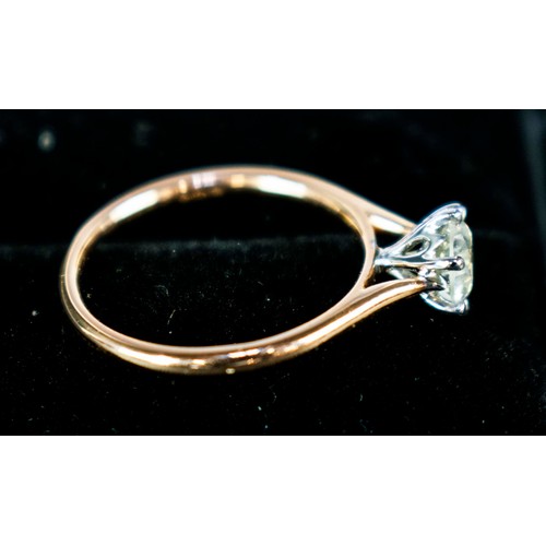 17 - AN 18CT ROSE GOLD DIAMOND SOLITAIRE RING, the round brilliant cut stone of approximately 0.78 carats... 