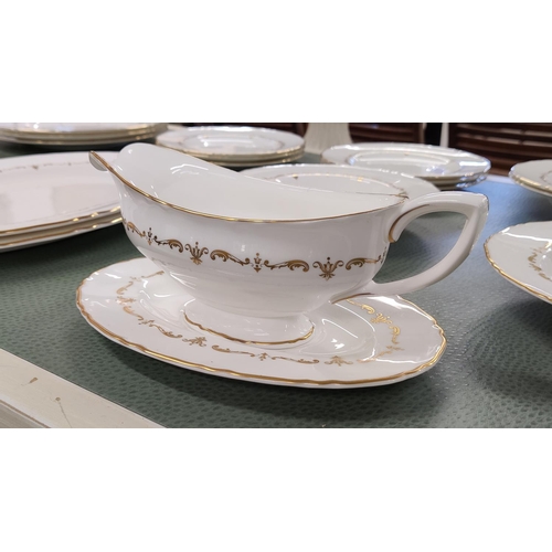 8 - ROYAL WORCESTER 'GOLD CHANTILLY' PART DINNER SERVICE, seven dinner plates, six side plates, seven bo... 