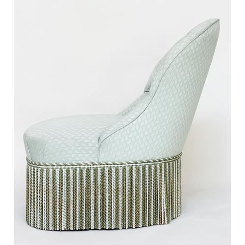 182 - SLIPPER CHAIR, with green/white oak leaf upholstery with arched buttoned back and deep fringe.