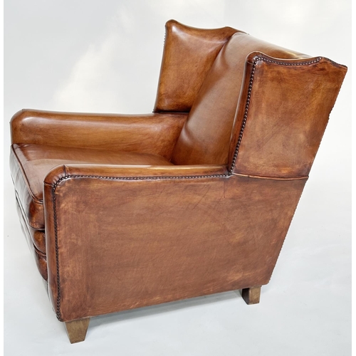 184 - WING ARMCHAIRS, a pair, early 20th century style in hand finished soft tan leather upholstery. (2)