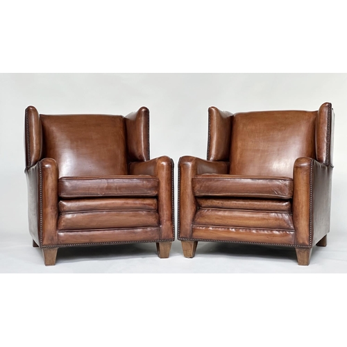 184 - WING ARMCHAIRS, a pair, early 20th century style in hand finished soft tan leather upholstery. (2)