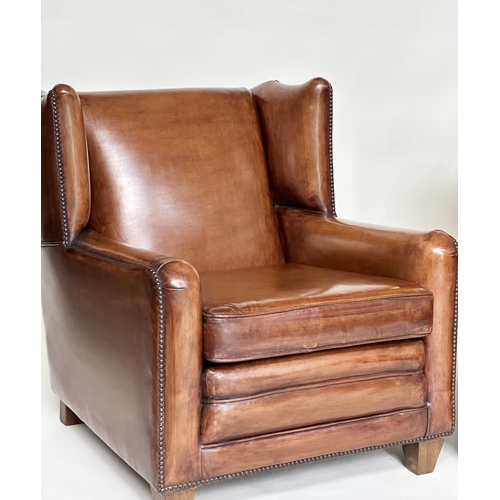 184 - WING ARMCHAIRS, a pair, early 20th century style in hand finished soft tan leather upholstery. (2)