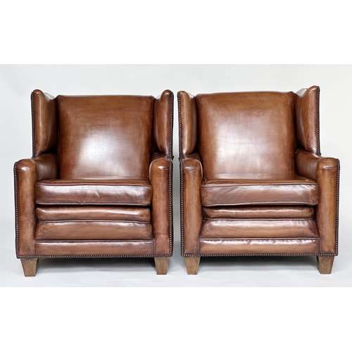 184 - WING ARMCHAIRS, a pair, early 20th century style in hand finished soft tan leather upholstery. (2)