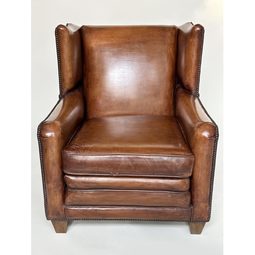 184 - WING ARMCHAIRS, a pair, early 20th century style in hand finished soft tan leather upholstery. (2)