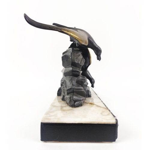 40 - ART DECO SPELTER SEAGULL FIGURE GROUP, raised on a white and black marble base, 26cm high, 51cm wide