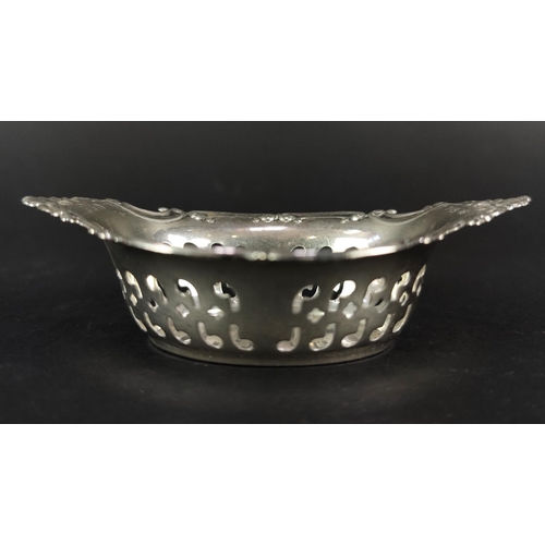 55 - SILVER SMALL DISHES, four pierced, and three items of Pewter. (7)