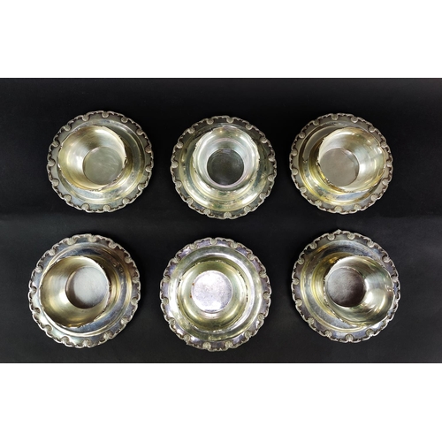 9 - A SET OF SIX WHITE METAL DESSERT BOWLS AND MATCHING STANDS, each with scalloped edges, the bowls mea... 