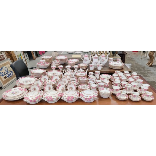 12 - A ROYAL ALBERT 'LADY CARLYLE' DINNER AND TEA SERVICE, comprising tea cups and saucers, coffee cups a... 