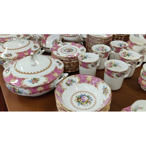 12 - A ROYAL ALBERT 'LADY CARLYLE' DINNER AND TEA SERVICE, comprising tea cups and saucers, coffee cups a... 