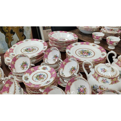 12 - A ROYAL ALBERT 'LADY CARLYLE' DINNER AND TEA SERVICE, comprising tea cups and saucers, coffee cups a... 