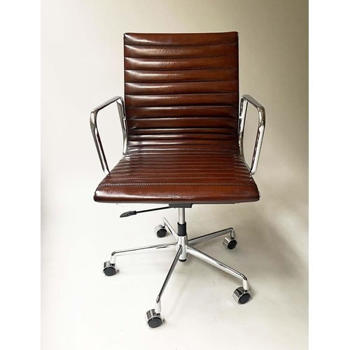 185 - REVOLVING DESK CHAIR, Charles and Ray Eames inspired with ribbed hand finished tan brown leather sea... 