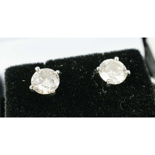 25 - A PAIR OF SOLITAIRE BRILLIANT CUT DIAMOND STUD EARRINGS, 18ct white gold backs, each stone of approx... 