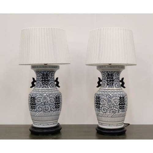 411 - TABLE LAMPS, a pair, Chinese export style blue and white ceramic, with shades, 60cm H. (2)