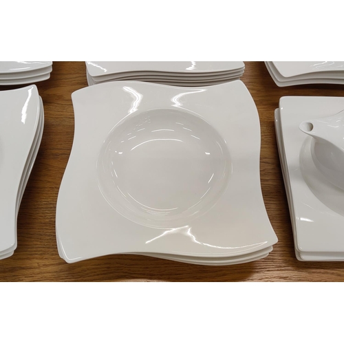 14 - A VILLEROY & BOCH NEWWAVE WHITE PART DINNER SERVICE, comprising 12 dinner plates, 12 soup plates, 12... 