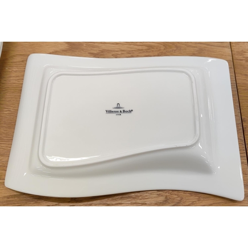 14 - A VILLEROY & BOCH NEWWAVE WHITE PART DINNER SERVICE, comprising 12 dinner plates, 12 soup plates, 12... 