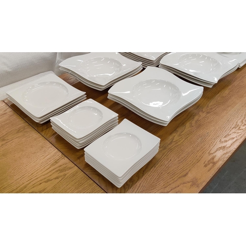 14 - A VILLEROY & BOCH NEWWAVE WHITE PART DINNER SERVICE, comprising 12 dinner plates, 12 soup plates, 12... 