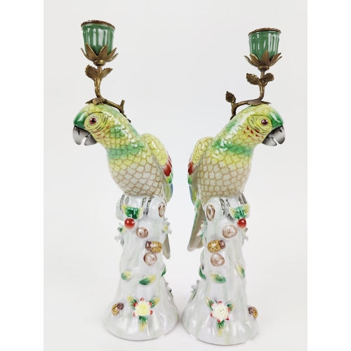 369 - PARROT CANDLESTICKS, a pair, ceramic and gilt metal, 35cm H. (2)