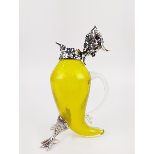 381 - CLARET JUG, in the form of a parrot, polished metal and yellow glass, 27cm H.