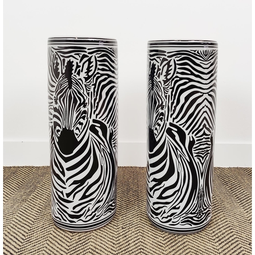 390 - STICK STANDS, a pair, zebra design ceramic, 60cm H x 22cm W. (2)