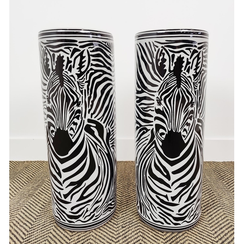 390 - STICK STANDS, a pair, zebra design ceramic, 60cm H x 22cm W. (2)